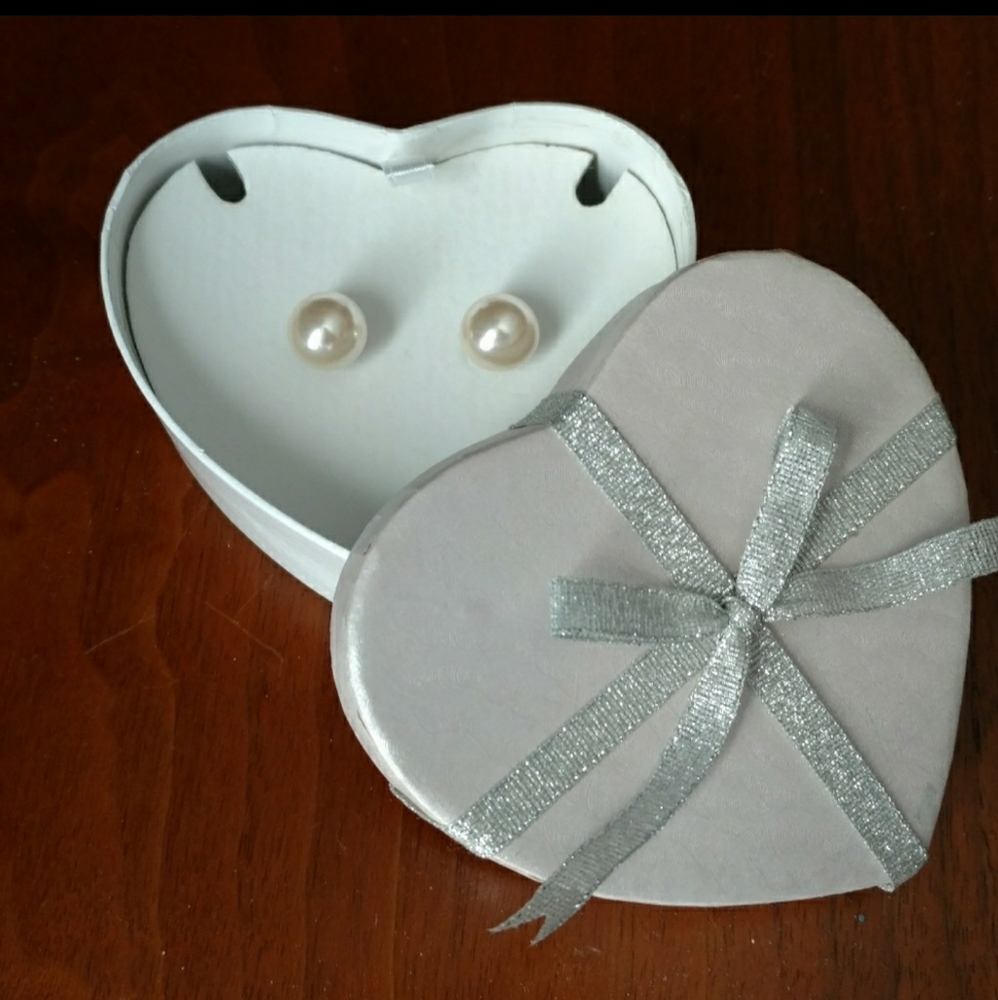Simulated Pearl stud earrings.